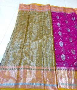 Vibrant Pink Saree with Silver Motifs