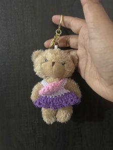 This adorable plush teddy bear keychain features