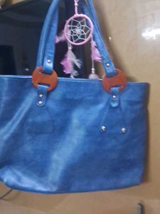 Stylish Blue Tote Bag with Wooden Accents