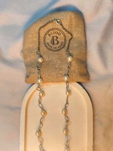 Elegant Pearl Necklace with Bow Charm