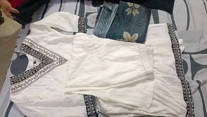 Elegant White Kurta with Embroidered Neckline