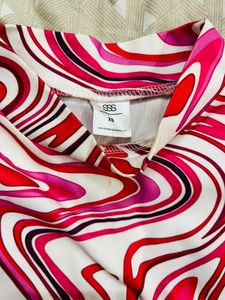Vibrant Swirl Print Mock Neck Top