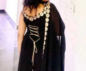 Elegant Black Saree with Gold Embellishments