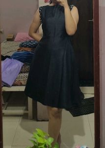 Elegant Black Dress with Pearl Accents