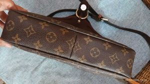 LV sling bag in mint condition, without code.