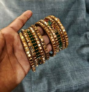 Set of Golden Bangles with Green Embellishments
