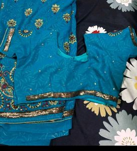 Stunning Teal Embellished Saree