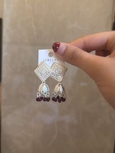 Elegant Jhumka Earrings with Red Beads