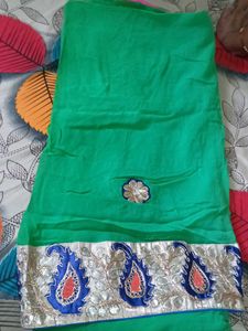 Elegant Green Saree with Embellished Border