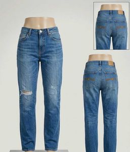 Distressed Blue Denim Jeans