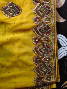 Exquisite Yellow  heavy Embellished Saree