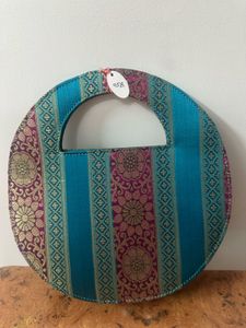 Circular Clutch with Embellishments