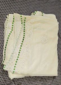 Elegant Cream Saree with Green Embellishments