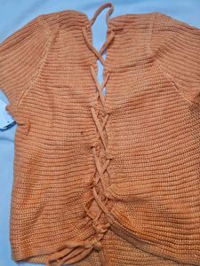 Orange knitted cropped top