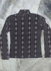 See through Patterned Turtleneck Top
