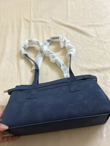 classy navy blue leather suede bag