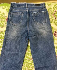 Distressed Blue Denim Jeans