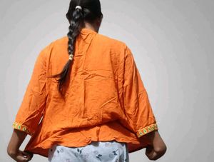 Vibrant Orange Embroidered Kurta Top