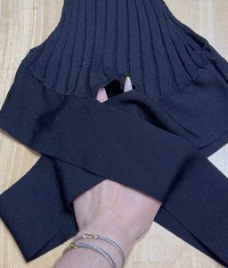 Unique and Rare Black Ribbed Knit Bodysuit