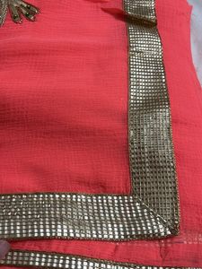 Stunning Coral Saree with Gold Border