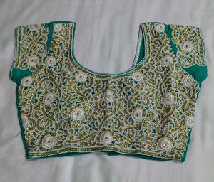 Elegant Teal Embroidered Saree...