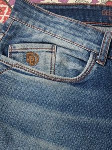 Distressed Blue Jeans