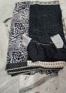 Elegant Black Saree with Animal Print