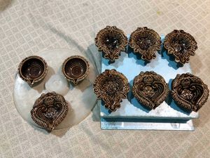 Set of New 9 ceramic designer diyas together.
