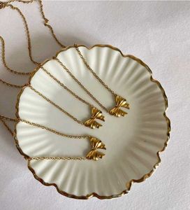 Gold Bow Pendant Necklace