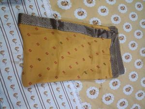Elegant Yellow Saree with Contrasting Blouse