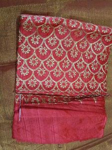 Embroidered blouse material .