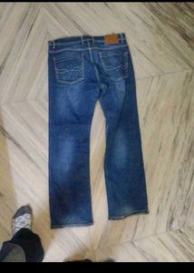 Blue Denim Jeans with Bear Patch