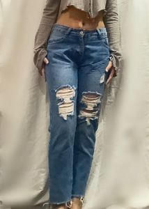 Distressed Blue Denim Jeans
