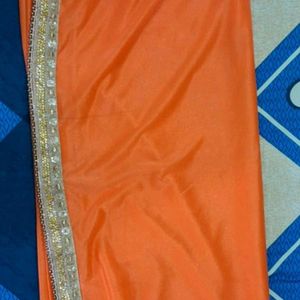 Sparkling Orange Saree with Golden Border ✨
