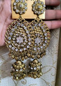 Stunning Golden Jhumka Earrings with White Stone