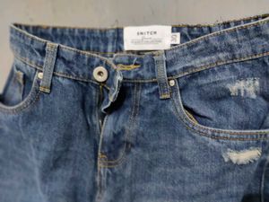 Distressed Blue Denim Jeans