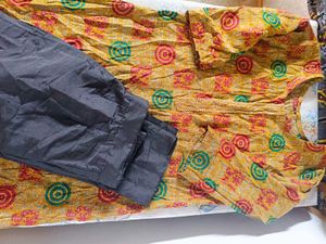 Yellow Printed Kurta with Black Pants