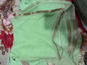 Elegant Mint Green Kurta with Embellished Neckline
