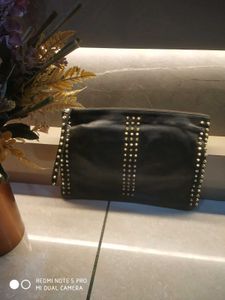 black stylish cultch pouch