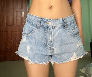 Distressed Light Wash Denim Shorts