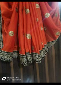 Orange Saree with Embellished Blouse