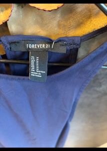 Stylish Blue Sleeveless Top further discounted