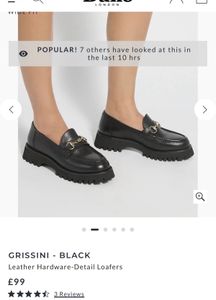 Chic Black Loafers with Gold Accent