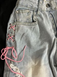 Distressed Denim Jeans with Pink Laces
