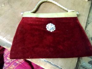 Beautiful Maroon Purse With Elegant White  Stone.