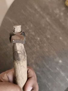 Hammer with wood stick