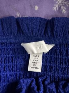 H&amp;M smocked blue dress - Size small