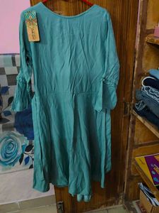 Beautiful Teal Kurta with Floral Embellishment