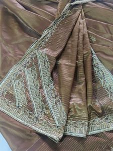 Elegant Brown Striped Saree with Gold Embroidery