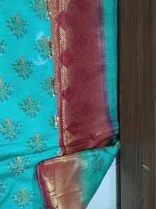 Beautiful Teal Saree with Gold Border